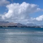 a boat floating on top of a large body of water