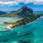 aerial photography of island beside body of water