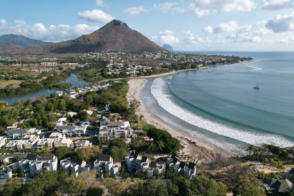 Coastal town with a mountain and a beach.