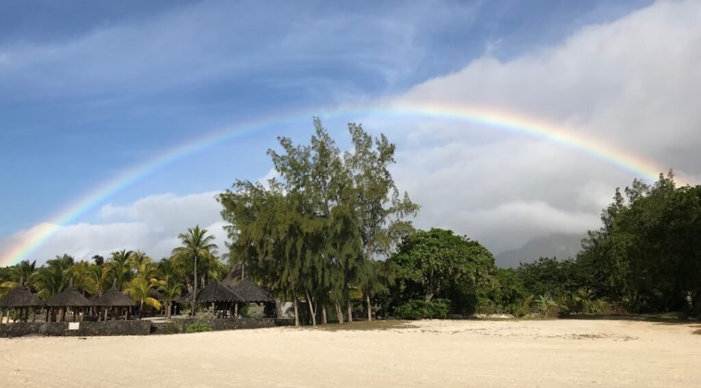 rainbow over trees mauritius weather