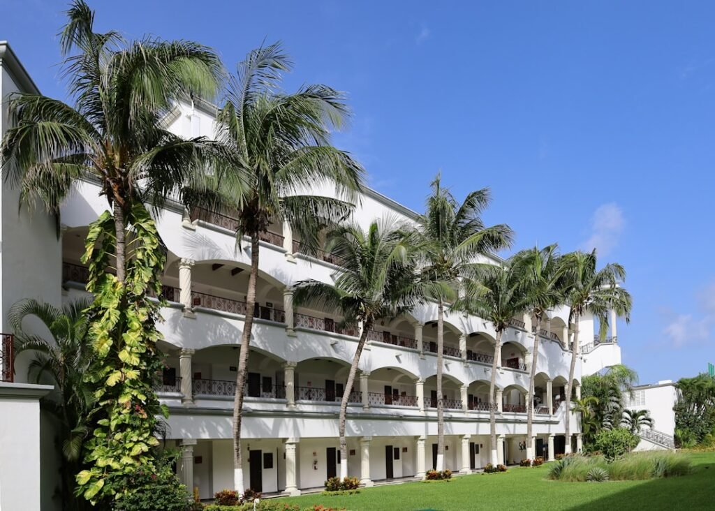 a building with palm trees