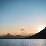 landscape photography of mountain near body of water